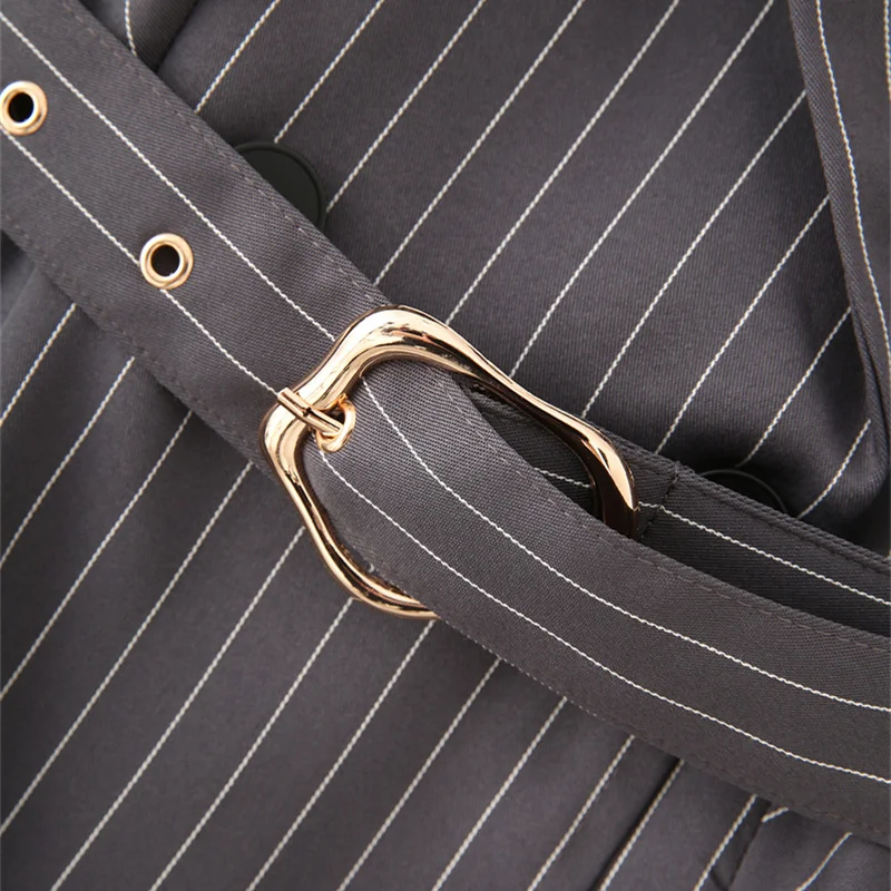 KEANKETIAN PRIMAVERA/otoño nuevo traje de rayas grises de diseño Irregular para mujer prendas de vestir exteriores para oficina con cinturón abrigo ajustado de longitud media