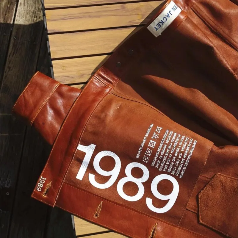 A washed hand-aged full-grain cowhide coat without lining  leather