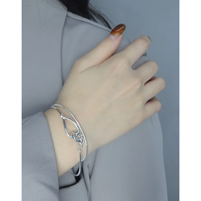 S25 فضة دعم كشف المتخصصة تصميم الشعور الحد الأدنى الفاخرة مزاجه مهرج ثعبان العظام سوار مزدوج الإناث.