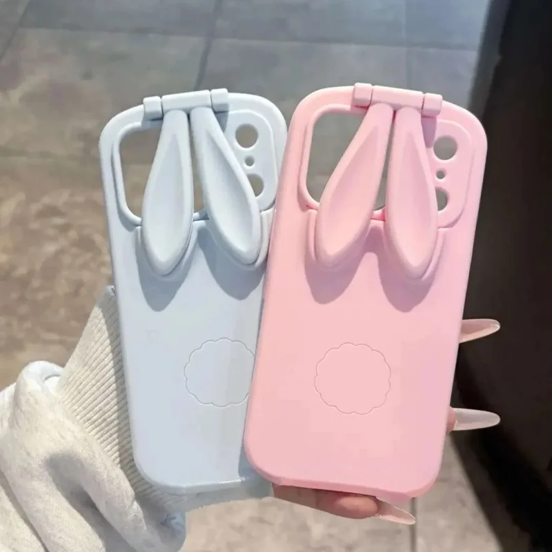 

Cute cartoon Pink blue rabbit ear foldable phone case iPhone 1716 15 14 13 ProMax rabbit Holder soft silicone shockproof Cover