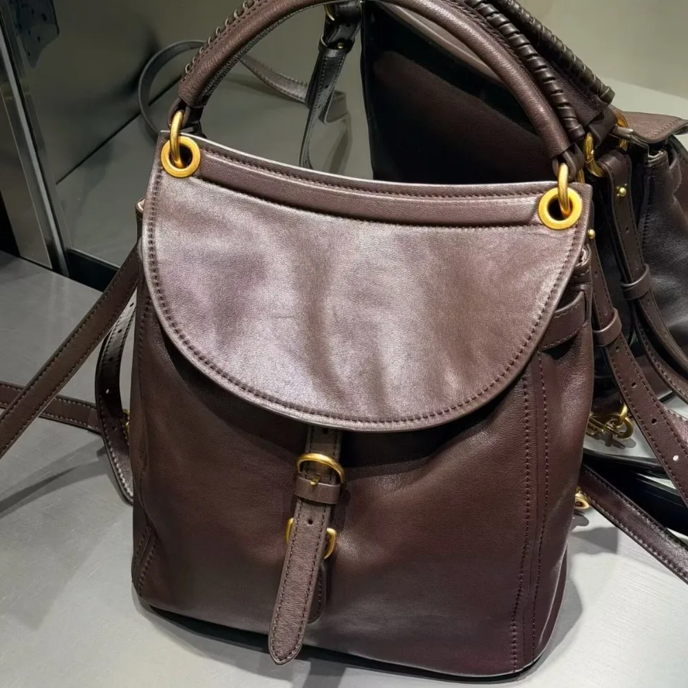 Autumn and Winter Niche Design Retro Flip Backpack Female Coffee Versatile bag Commuter Portable High-end Sense Female Fashion