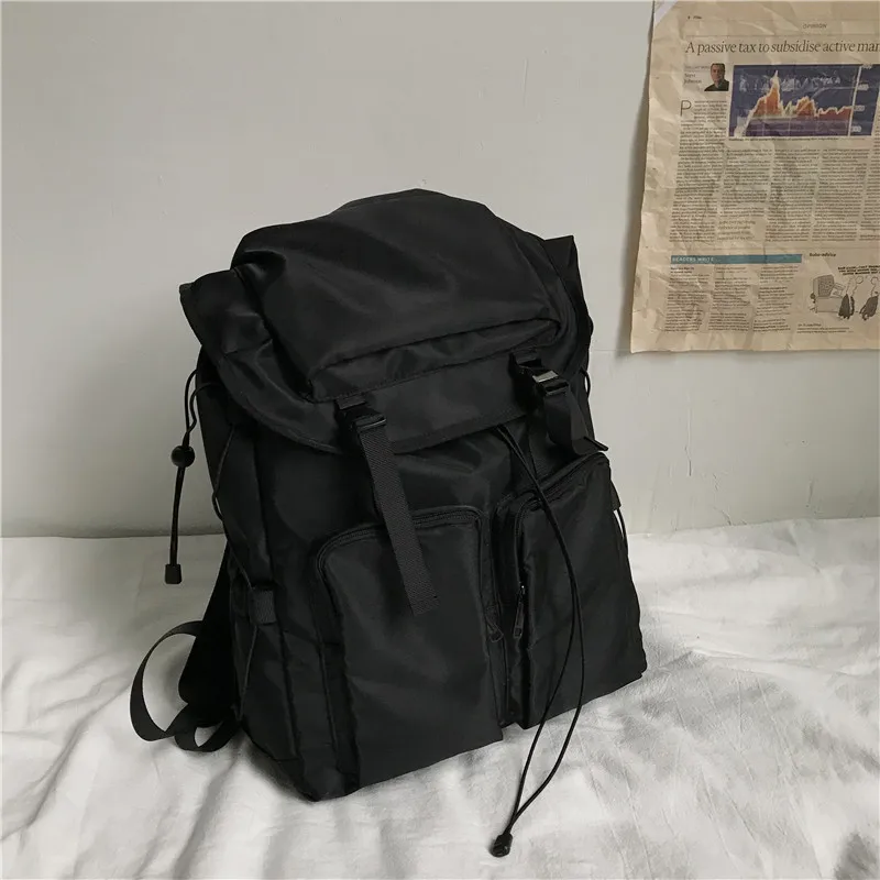 

Korean style tooling dark style backpack men and women Japanese travel backpack men retro Hong Kong style student school bag