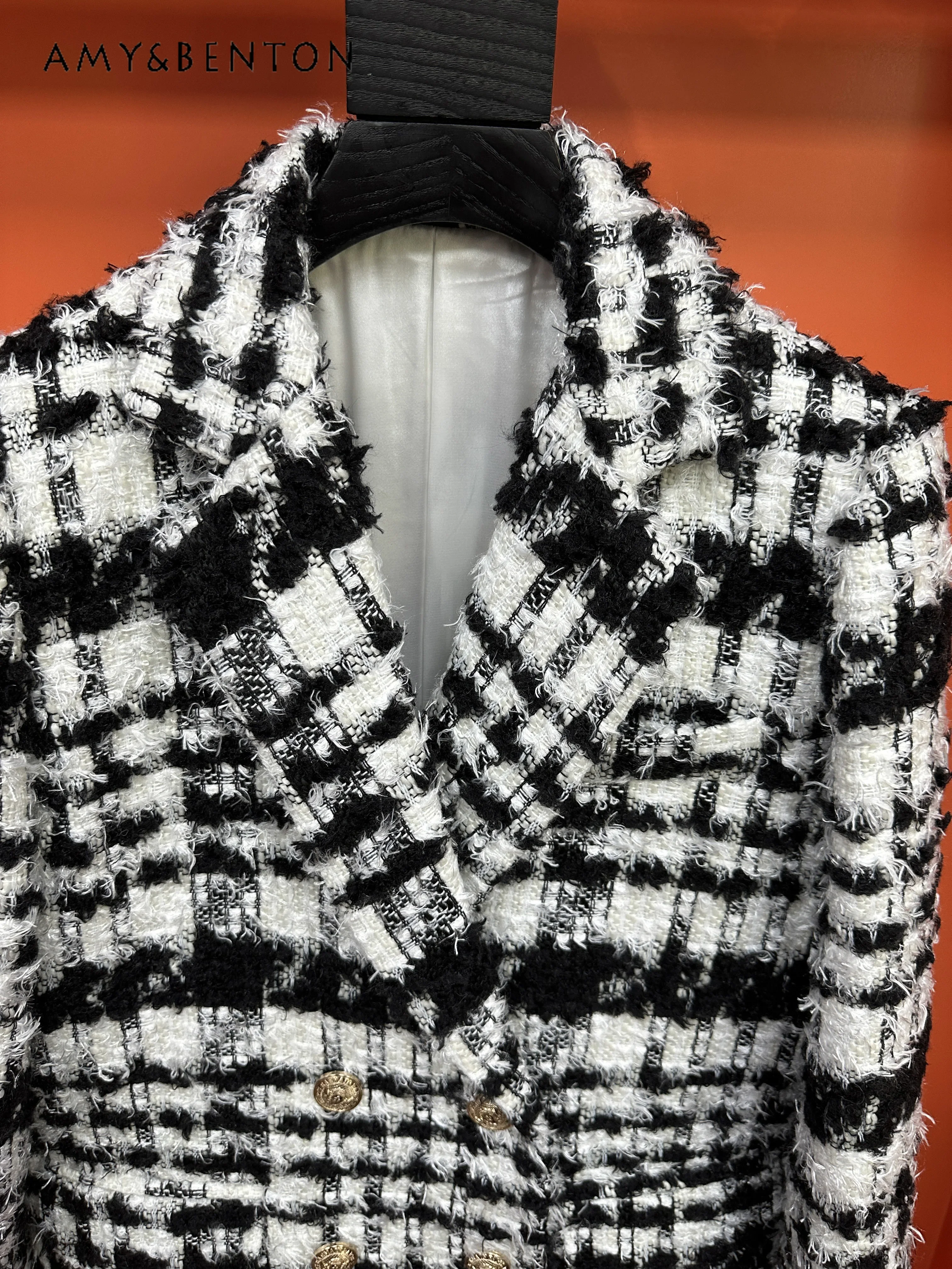 Cappotto di lana sottile allentato doppiopetto in bianco e nero stile pendolare Giacca da donna con nappe da socialite francese