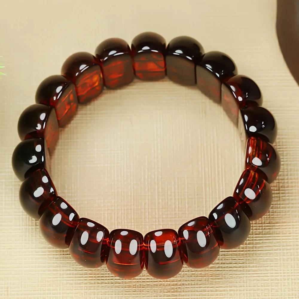 

Blood silk ber bracelet, hand row bracelet, retro landscape amber elastic rope, men's and women's hand row bracelet.