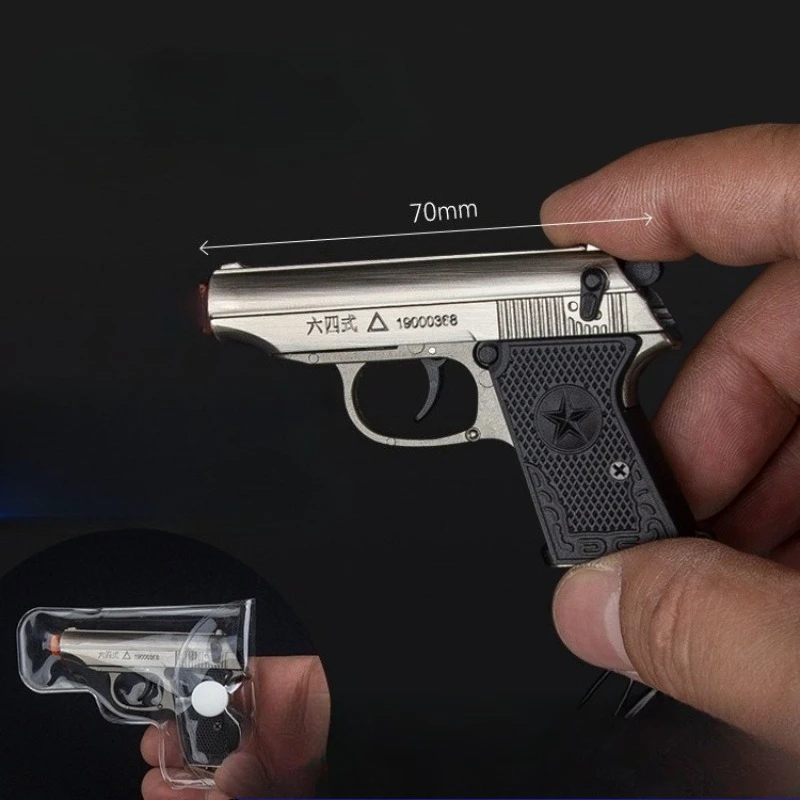 

1:3 Scale Type 64 Alloy Gun Model, Detachable Metal Keychain Ornament, Pop-out Shell Decompression Toy, Gift for Men.