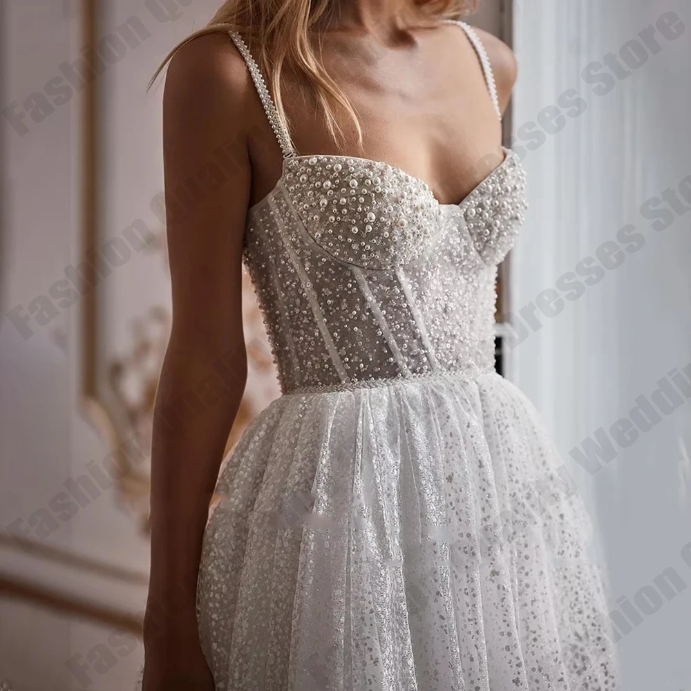 

Luxury Sequins A-line Wedding Dresses 2026 Spaghetti Straps Pearls Beads Bride Gown customized Bridal Gowns Vestidos De Noiva