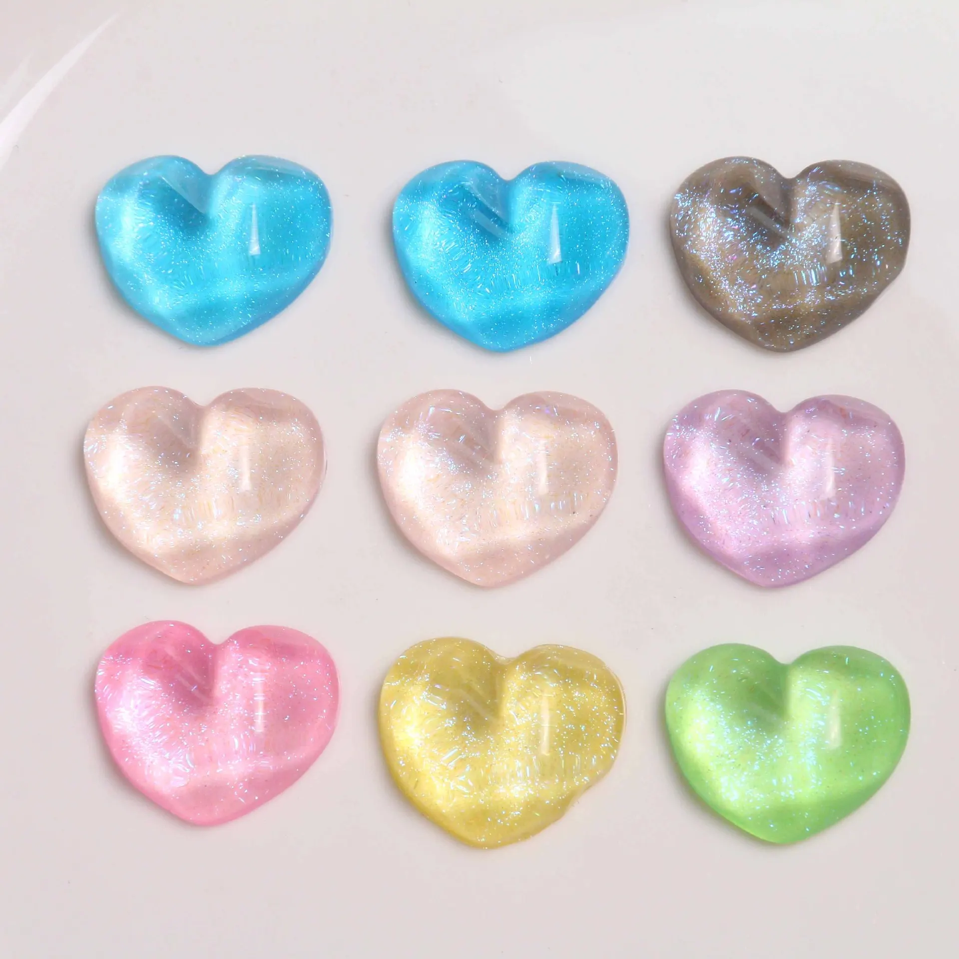 

Newest 100pcs 21*18mm Bright Jelly Colorsd Facated Love Heart Flatback Resin Cabochons Beading Material For Girls Hair Clips