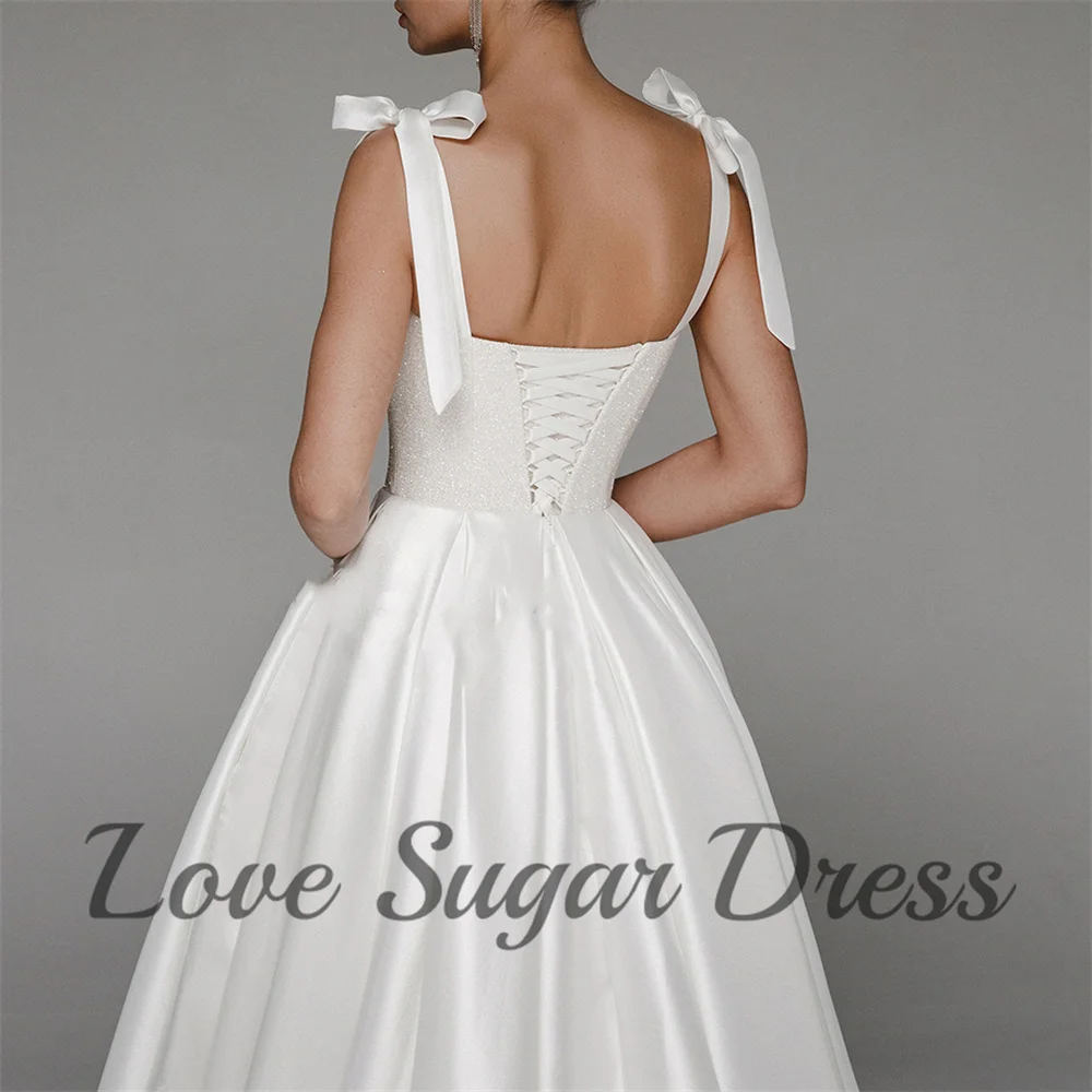 Wykwintne suknie ślubne Sweetheart Eleganckie długie suknie ślubne A Line Sparkly Satin Back Lace Up Bride Dress vestidos de novia