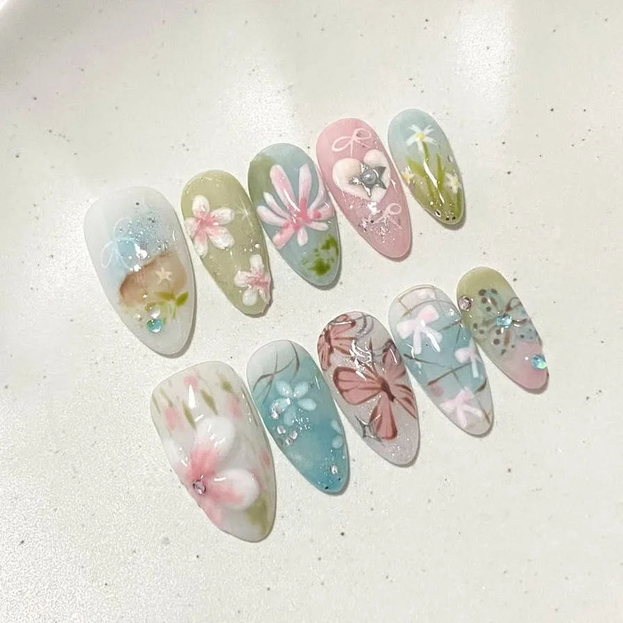 

24Pcs Blue Pink Smudge False Nails Press on Bow Flower Butterfly Star Full Cover Nails Tips Mid-length Almond Wearable Fake Nail