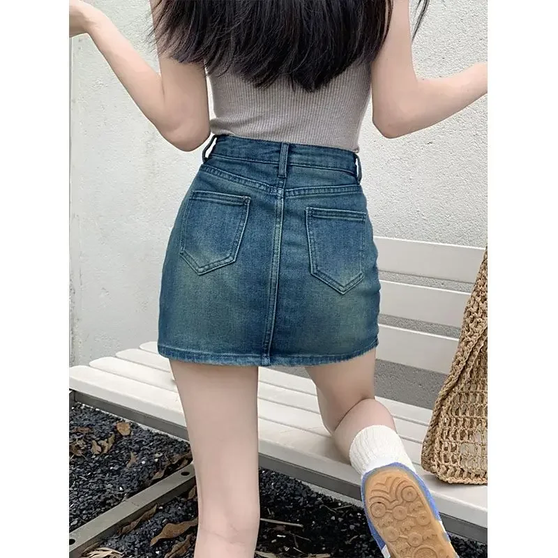 التنانير الصغيرة الأمريكية خمر الدنيم المرأة الصيف موضة عالية الخصر مستقيم قصيرة عادية موضة الشارع الشهير تنورة قطنية