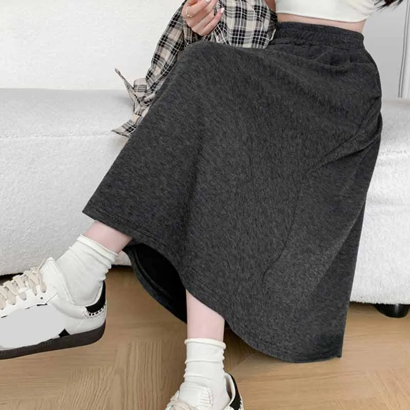 Cor sólida casual com bolsos a linha saias femininas coreano emagrecimento elástico de cintura alta saia longa mulher versátil midi saias