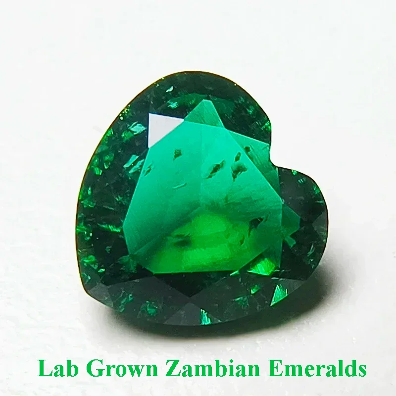 

Lab Grown Zambian Emeralds Hydrothermal Hand Cutting Heart Shape with Cracks Inclusions Inside Selectable AGL Certificate