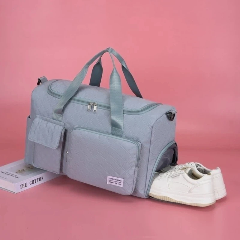 

New model of the dry/wet separation fitness bag, a large-capacity luggage bag that can be used with a roller suitcase. Stylish