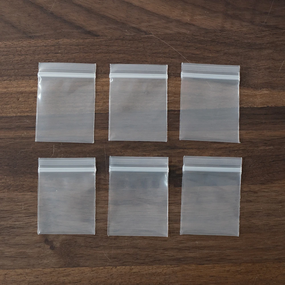 100Pieces Transparent Mini Small Plastic Zipper Bag Lock Resealable for Earring Ring Jewelry Food Pill Storage Packaging Pouch