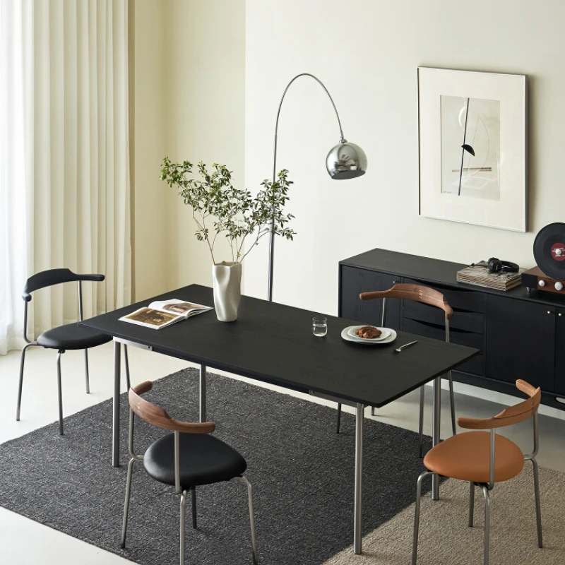 

Dining table and chair combination household minimalist all solid wood designer black simple stainless steel Z