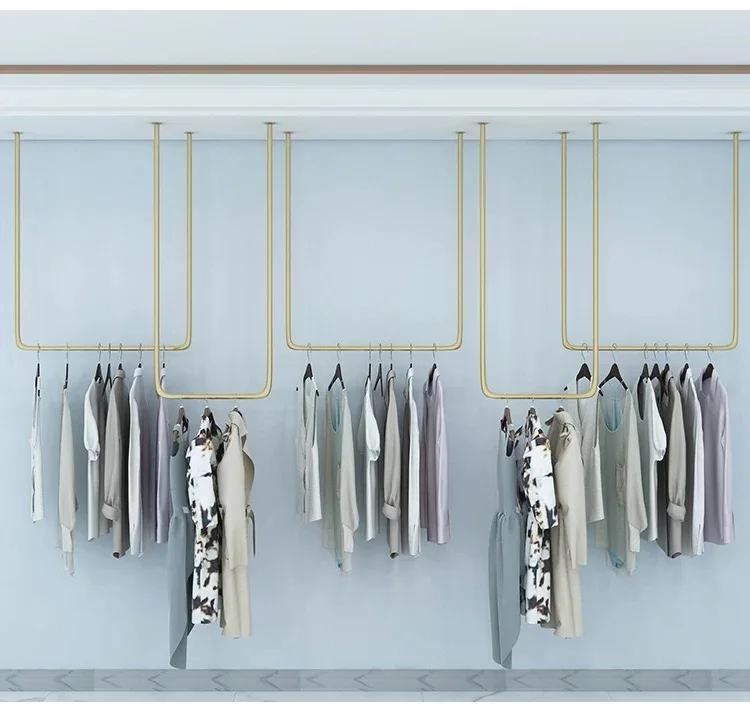 Custom.Modern Metall Decke Hängen Wand Kleidung Display Rack für Frauen Kleidung Shop Display Rack
