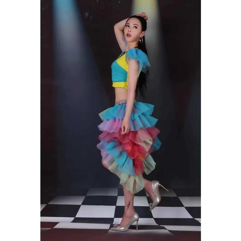 Female singer DJDS performs in fashionable jazz dance costumes on stage, modern dance fluffy skirts