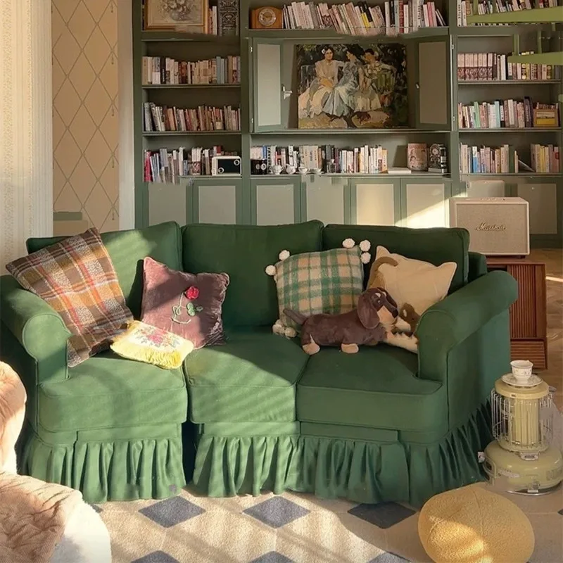 أريكة خضراء كسولة لثلاثة أشخاص