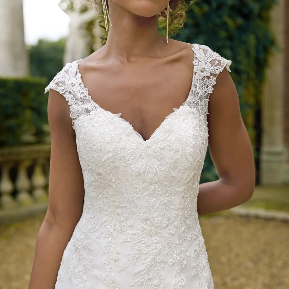 エレガントな V ネックのウェディングドレスワイドストラップブライダル成長アップリケレースイリュージョンカスタマイズ半袖 A ライン Vestidos デノビア