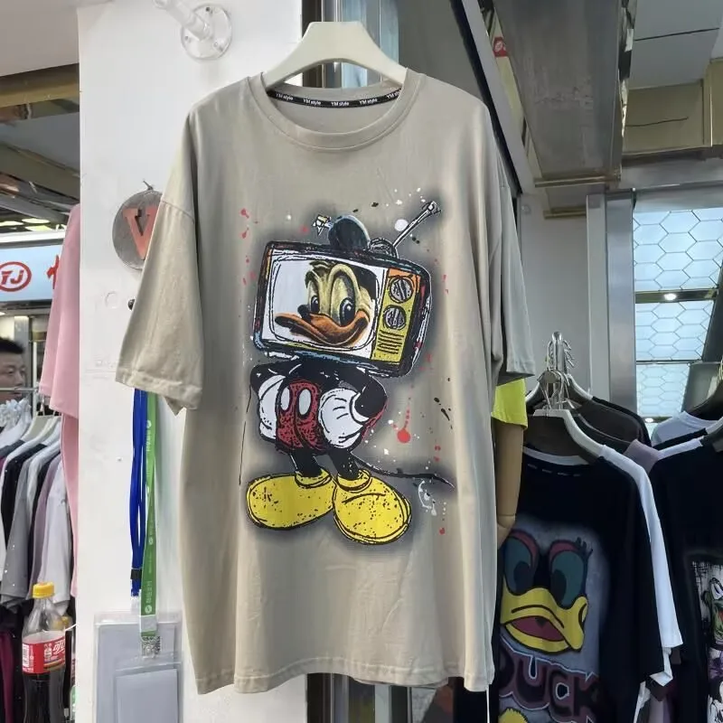 

Футболка большого размера в американском стиле ретро с героями мультфильмов, забавная футболка с изображением Дональда Дака, женская свободная тонкая модная универсальная футболка