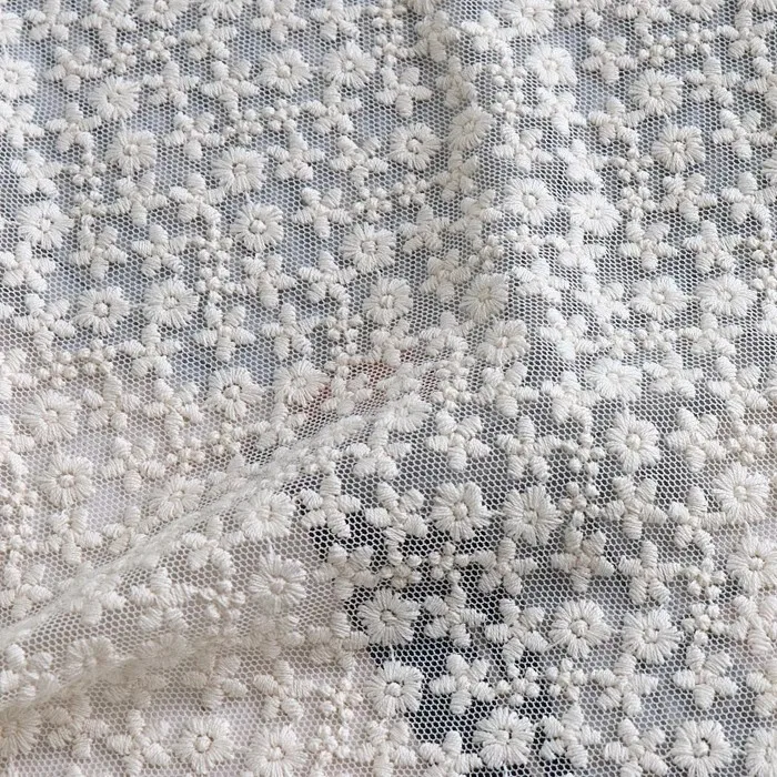 Beige three-dimensional floral mesh embroidery fabric winter coat primer lace fabric tablecloth background cloth fabric