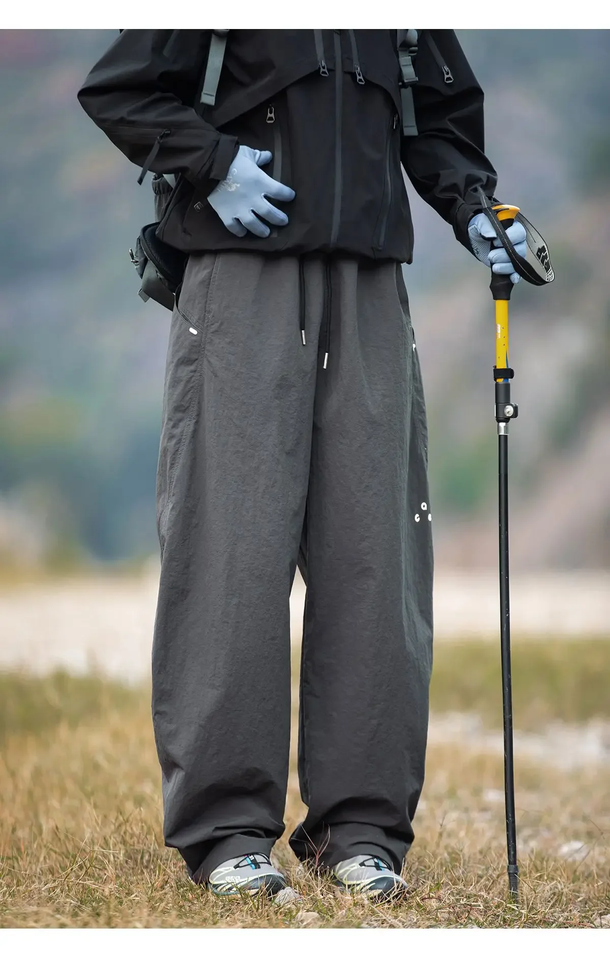 Herbstliche Outdoor-Hose, wasserabweisend, schnelltrocknend, gerade geschnitten, locker, lässig, mit elastischem Bund, für Männer und Frauen geeignet. – Detail 15