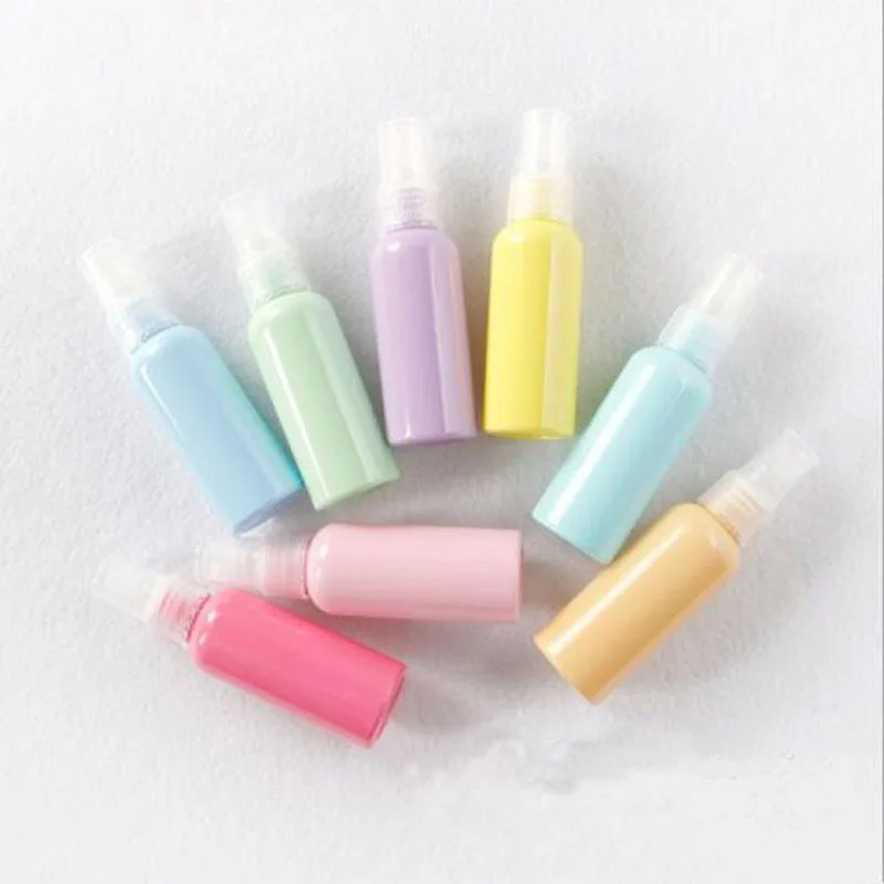 Macaron flacone Spray da viaggio a colori da 50ml cosmetici addensati confezione in plastica flacone Spray portatile flacone di profumo riutilizzabile