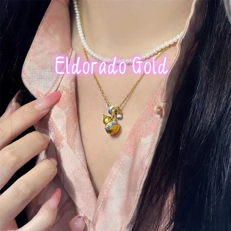 

Золотое колье-подвеска Eldorado Gold 2025 (202518K) из золота 750 пробы с узорами, имитирующими фарфор, с блестящей эмалью, для женщин