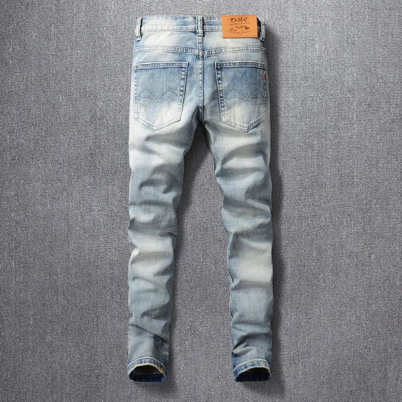 Jeans rasgado de ajuste fino elástico azul claro masculino, moda de rua alta, designer de bordados, calça jeans vintage