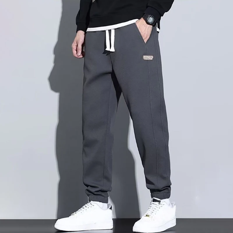 الرجال Sweatpants الربيع التطريز الرباط السراويل الفضفاضة الرياضة اللياقة البدنية عداء ببطء الشارع الشهير في الهواء الطلق تشغيل الرجال السراويل حجم كبير