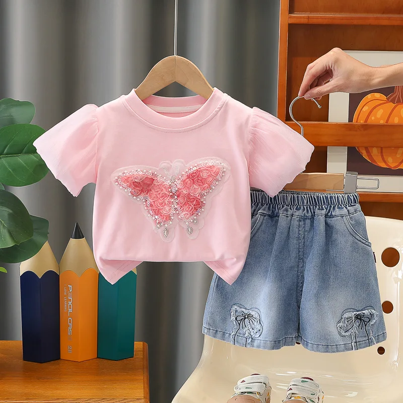 

2026 Summer New Children's Hot Selling Butterfly Decoration Bubble Sleeve Top and Denim Shorts Two-piece Set