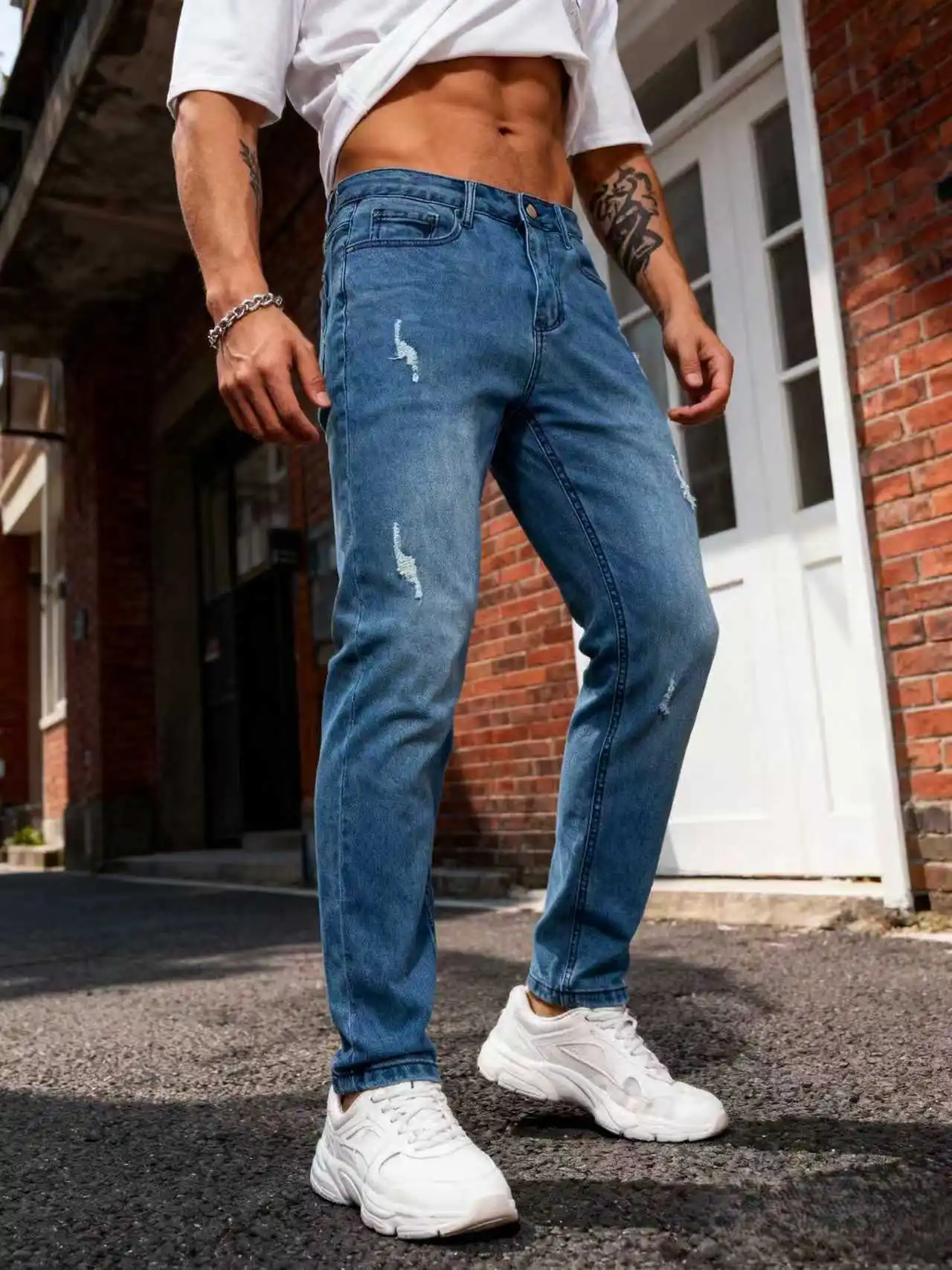 جينز ممزق عصري للرجال |   بنطال جينز مطاطي بقصة ضيقة باللون الأزرق الداكن، مثالي للعمل الذكي غير الرسمي والتواريخ والإجازات في عطلة نهاية الأسبوع