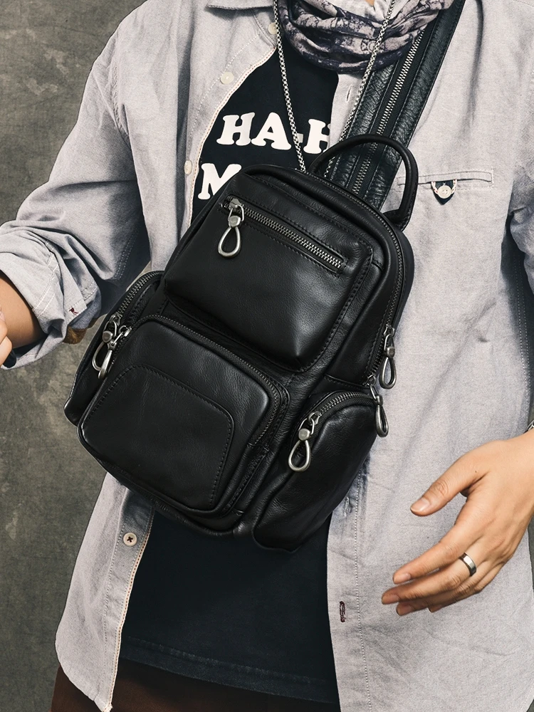 

PNDME casual handmade first layer cowhide men's chest bag outdoor travel luxury genuine leather women's multifunctional backpack
