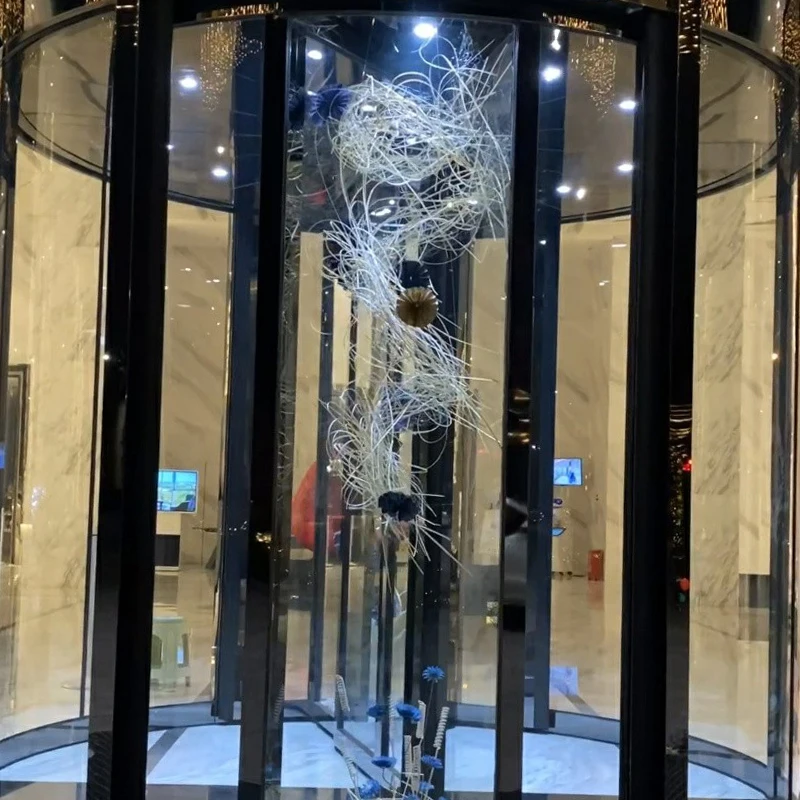

Hotel, revolving door, artificial flower, shopping mall, lobby, lobby, ornament, floor, decoration
