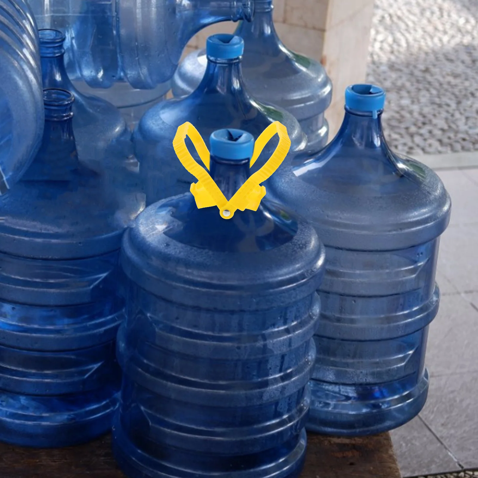 

4Pcs Water Bottle Handle Grip Ergonomic Anti-Slip Plastic Lifter for Heavy Jugs Home Office Use Gallon Bottle Grip