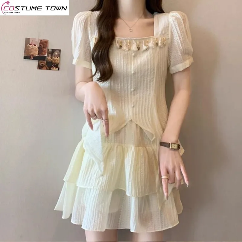 

Spring and summer new square neck tassel irregular bubble shirt+short skirt two-piece set