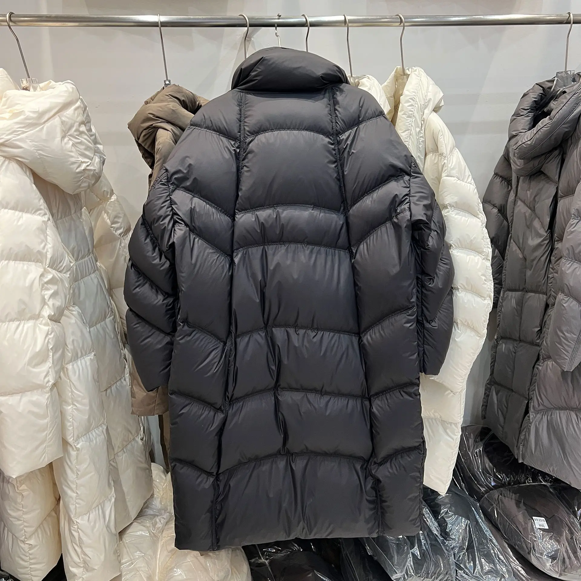 Winter witte eendendons lange sneeuwparka losse dikke dons pufferjas voor dames middellange casual modieuze jas