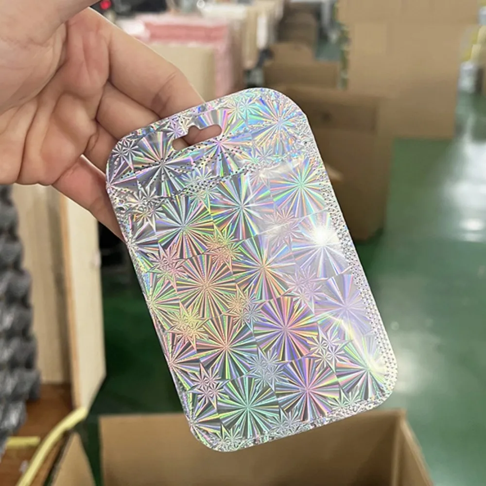 Bolsa de embalaje holográfica para almacenamiento de joyas, autosellante con láser de plata de 50 piezas, para pequeñas empresas