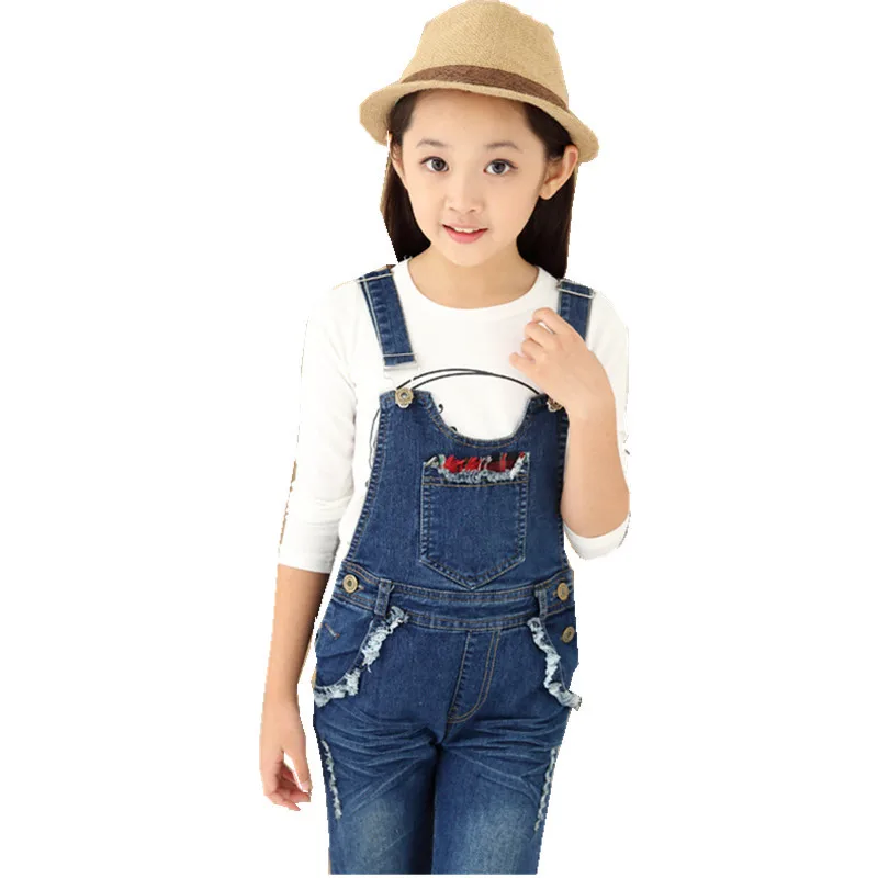 Nuovi bambini Salopette di jeans Tuta per ragazze Pantaloni jeans strappati con foro Bambini Tuta con bretelle in denim Jeans per adolescenti