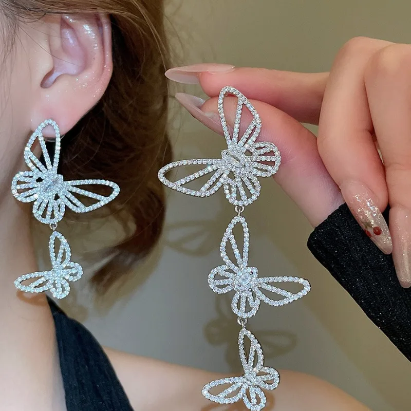 

Minar Fairy Full CZ Cubic Zirconia Hollow Out Butterfly Wings Asymmetric Long Dangle Earrings for Women Silver Plated Copper