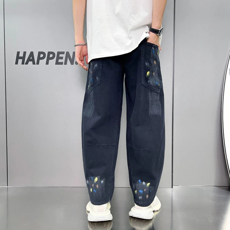 High-end personalized dyeing hand-painted graffiti men's jeans Korean version of the influx of men loose straight men's pants