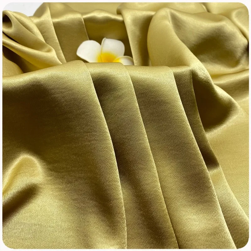 

This is a new type of fabric for fashionable evening dress that imitates acetic acid gold satin with glossy and flowing smooth