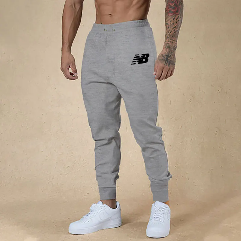 Men's sweatpants Spring Autumn Leisure Sports Men's Pants European Size Fit Solid Color Printed Sweatpants Running Training Pant