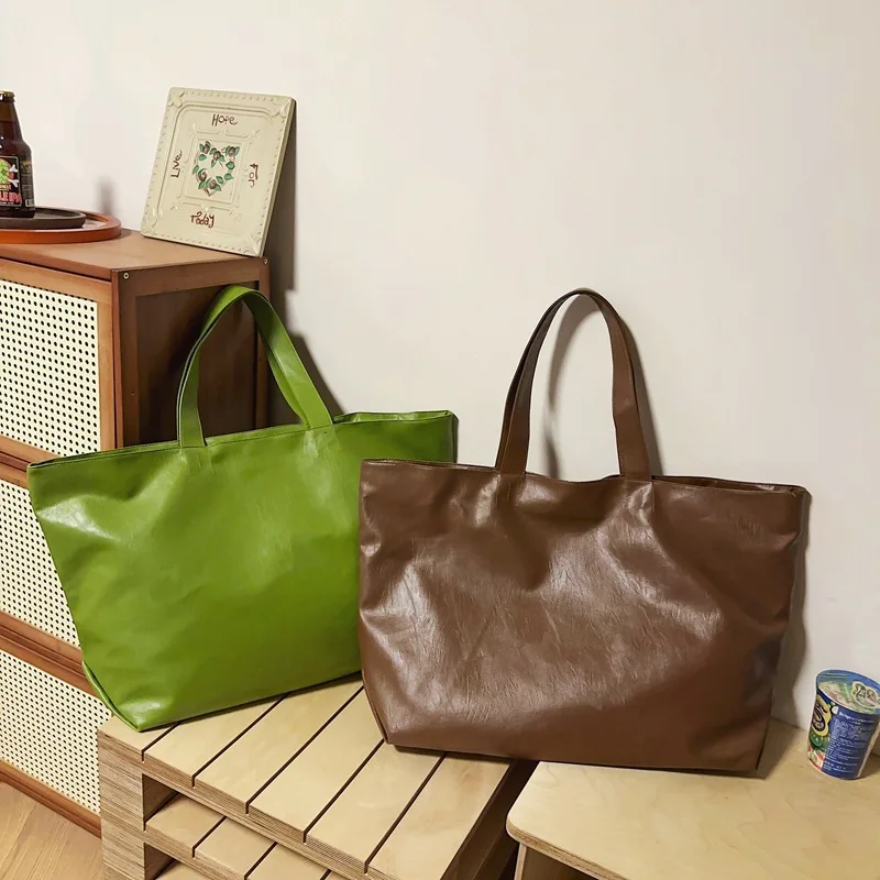 Borsa Tote borsa a tracolla grande capacità Unisex semplice portatile stile College quotidiano pendolare tempo libero Shopping Bag stoccaggio da viaggio