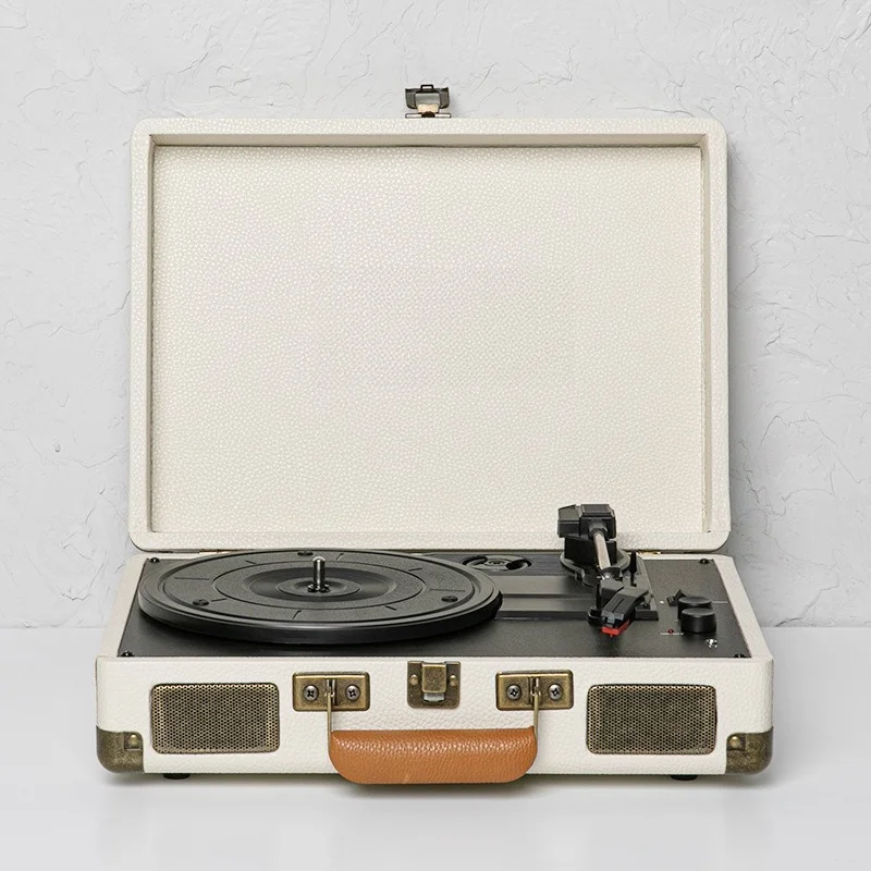 

Bluetooth speaker, portable suitcase, suitcase, record player.
