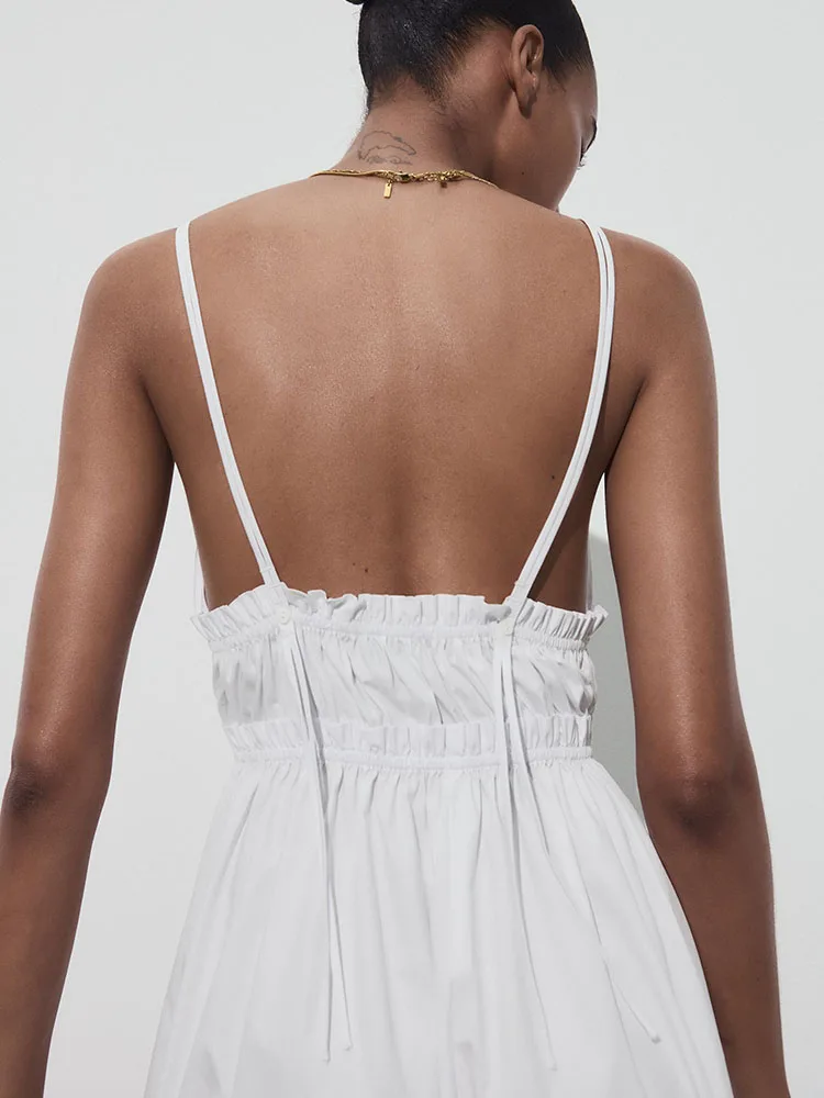 فستان صيفي جديد بسيط وأنيق من الشاش الحريري بدون حمالات وظهر مكشوف متوسط الطول بخصر مرتفع وتنورة طويلة للحفلات بلون واحد