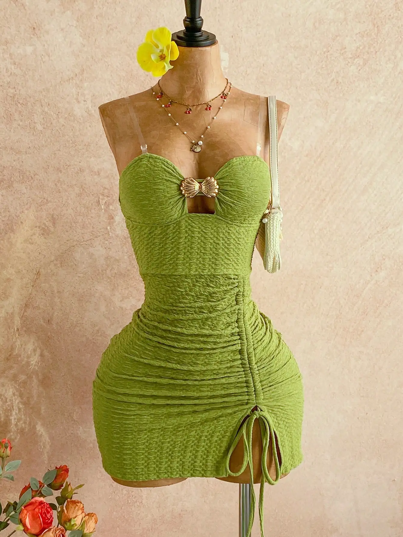 

Green Ruched Strapless Mini Dress with Metal Bow and Drawstring Detail