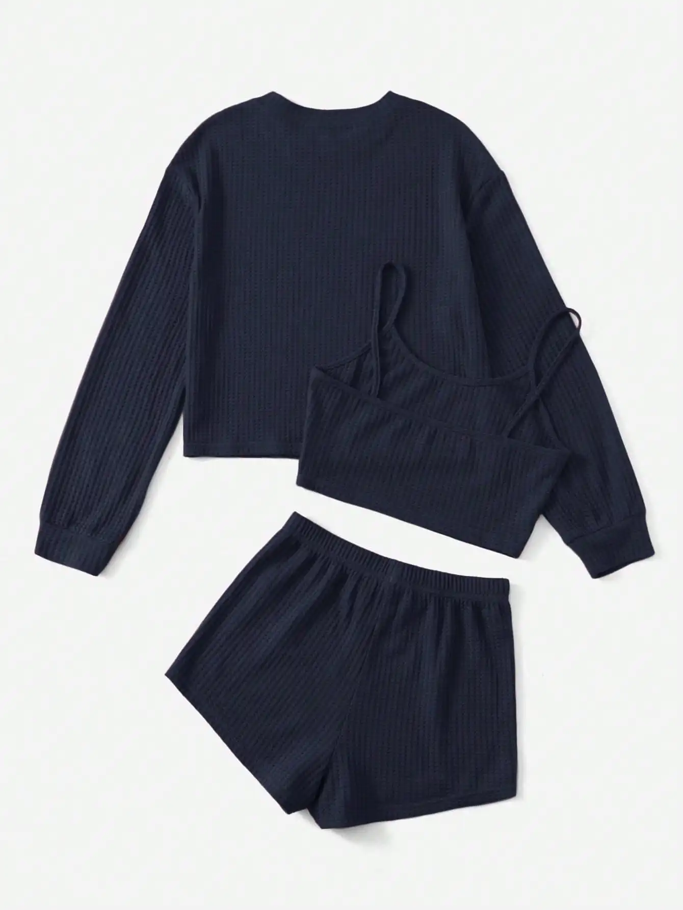 Luźne bluzy, topy bez rękawów i szorty można swobodnie łączyć i zmieniać do noszenia na co dzień, co jest idealne na codzienne wyjścia.