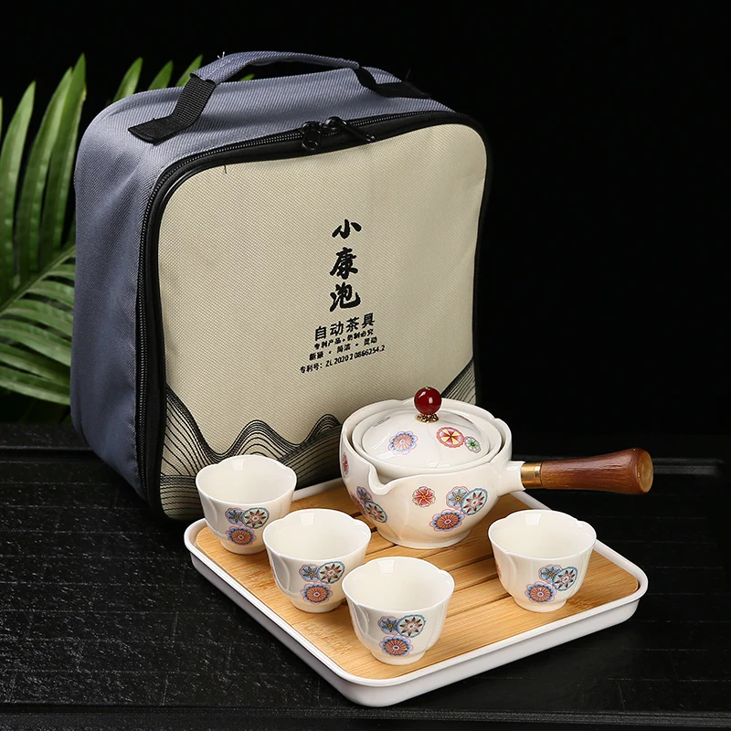 Porcelana chinês gongfu conjunto de chá portátil bule conjunto com 360 rotação fabricante de chá e infusor conjunto de cerimônia de chá conjunto