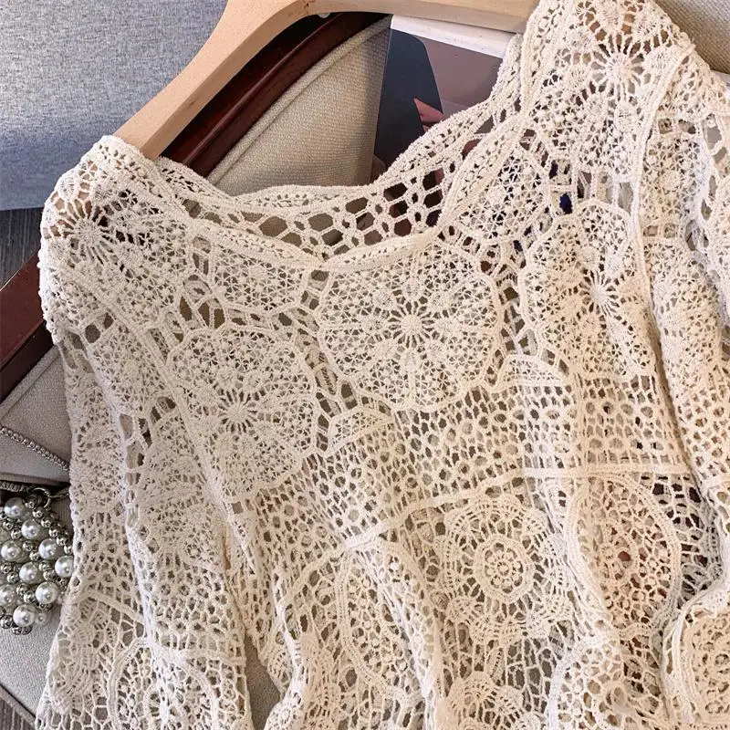 2025 Donne di estate T-shirt in maglia cava senza maniche di base in pizzo Moda Top T-shirt in pizzo Casual T-shirt allentate Maglieria Abito lavorato a maglia